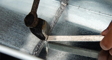 Menuiserie m&eacute;tallique avec barre &agrave; souder